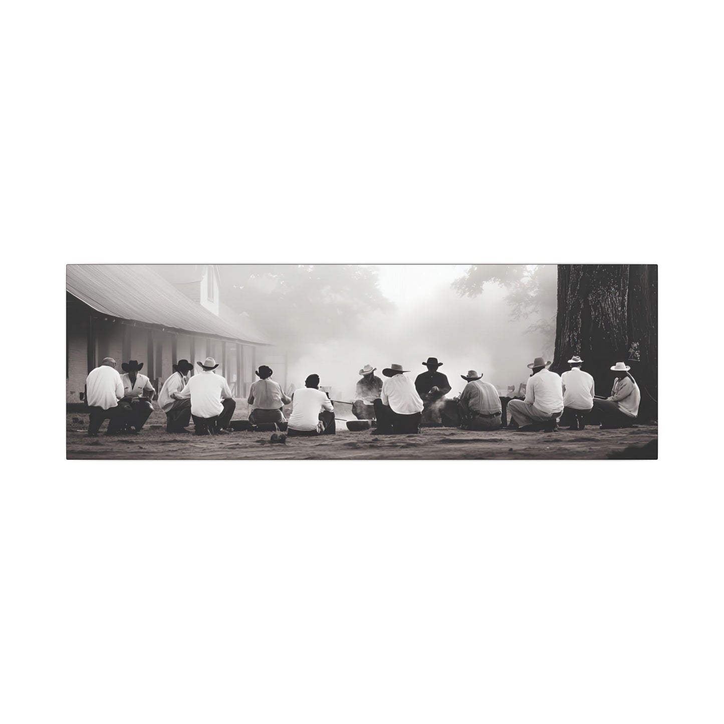 Western black and white canvas print of cowboys sitting in a circle around a smoking campfire near a rustic building, evoking tradition and camaraderie.