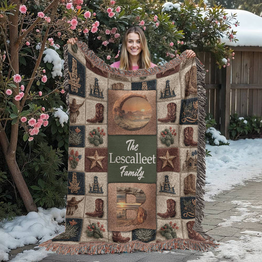 Medium size in use. Personalized Western blanket with family name and initials, featuring cowboy boots, oil rigs, cacti, and a patchwork background in rustic Texas-themed colors.