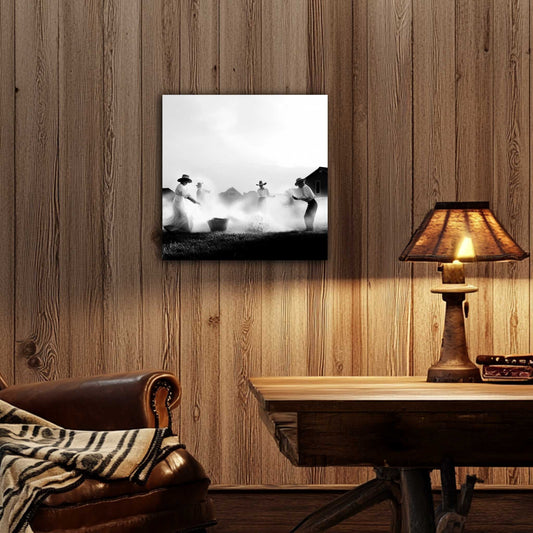 On the wall—Canvas print of a Western family joyfully splashing water in a sunlit yard, dressed in prairie-style clothing, captured in black and white.