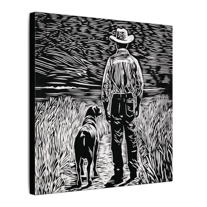 Side view. Canvas print in linocut style showing a cowboy and his dog standing side by side on a country path, gazing toward the horizon in black and white.