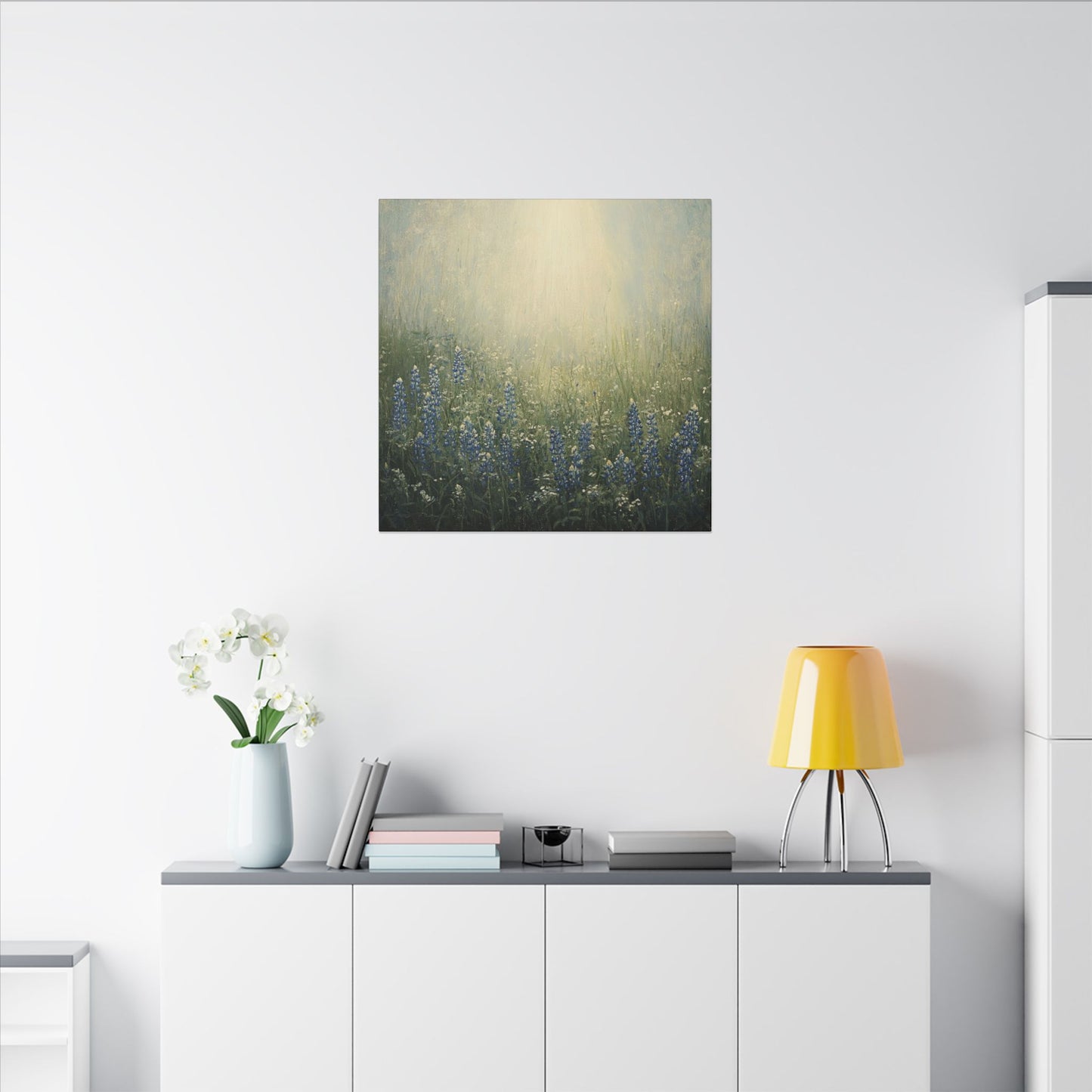 Second alternate room view. Canvas print of a sunlit Texas meadow filled with blooming bluebonnets and wildflowers, softly painted in golden morning light.